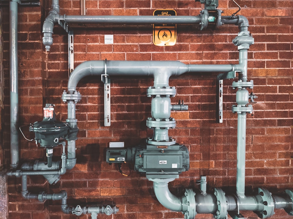 Professional plumber working on pipes in Dubai